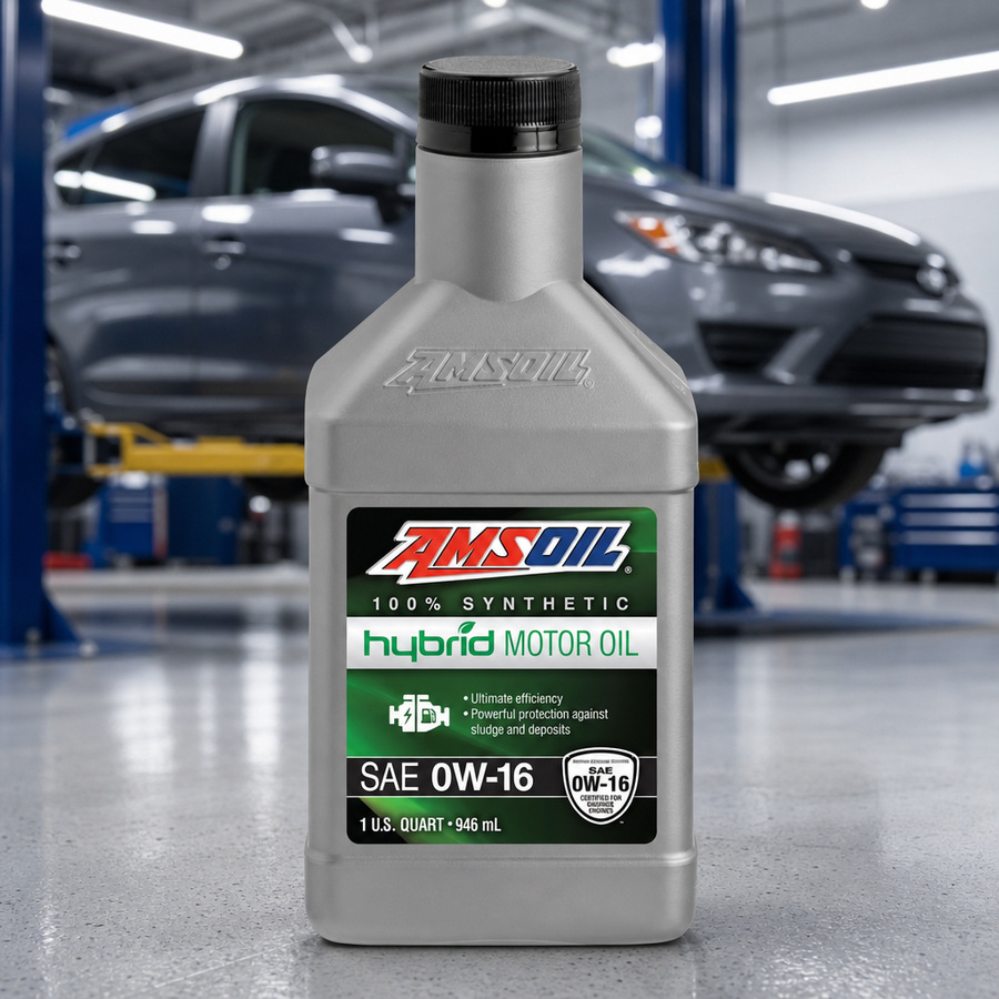 AMSOIL 0W-16 100% Synthetic Hybrid Motor Oil staged in a modern hybrid vehicle service bay