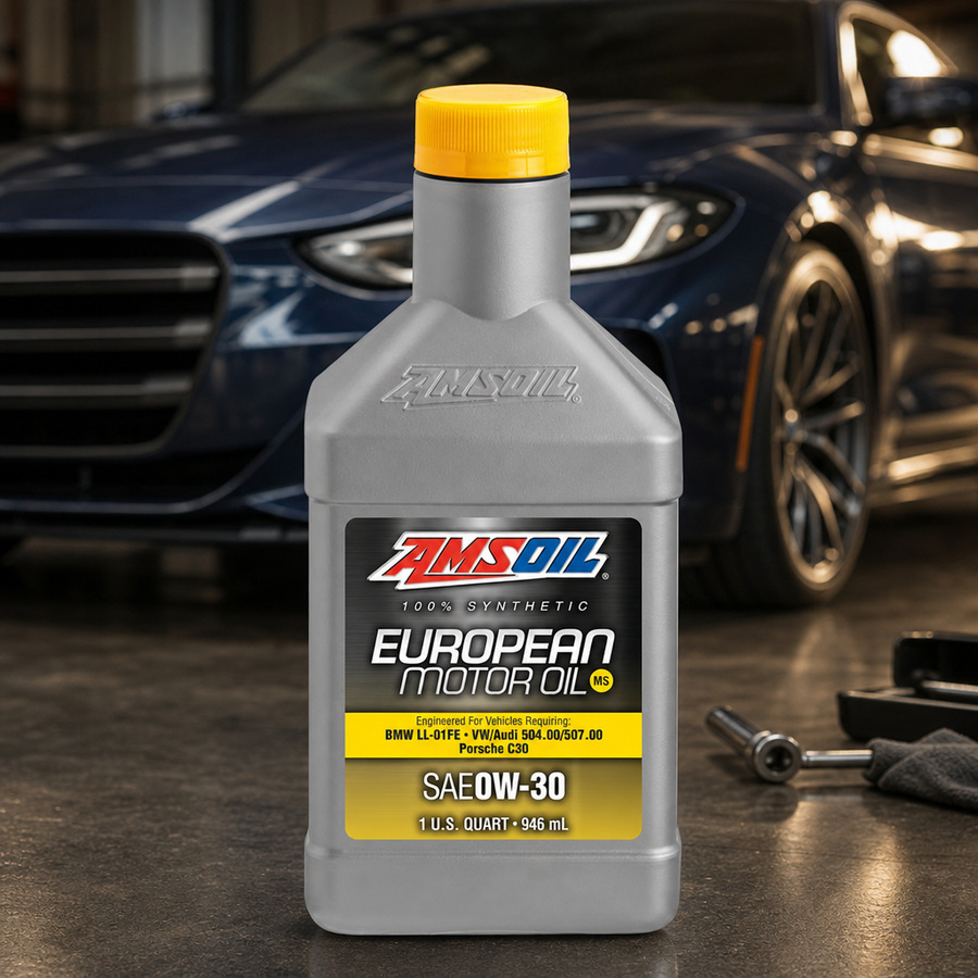 AMSOIL 0W-30 MS 100% Synthetic European Motor Oil staged in a European car service bay