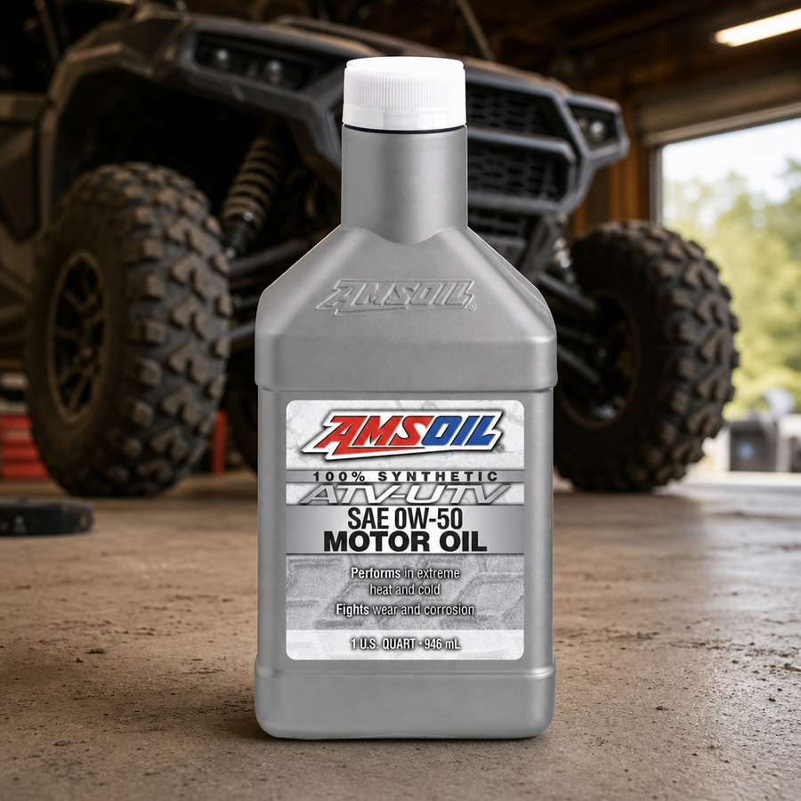AMSOIL 0W-50 100% Synthetic ATV/UTV Motor Oil staged in a powersports service garage