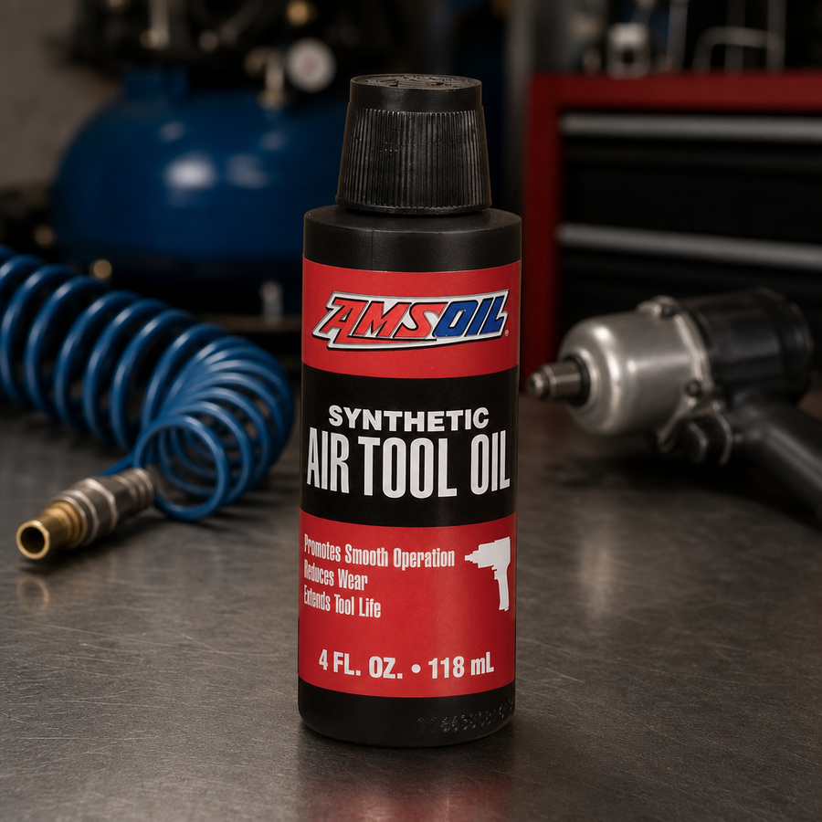 AMSOIL 100% Synthetic Air Tool Oil staged in an automotive workshop
