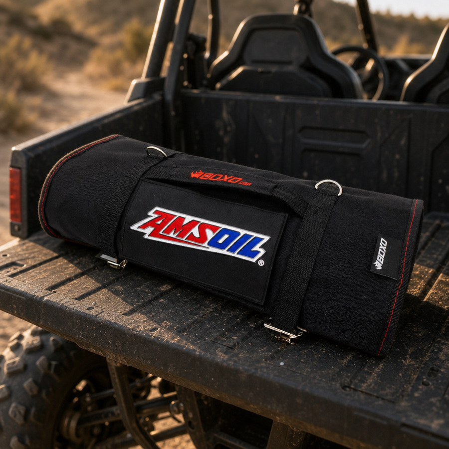 BOXO UTV Tool Roll staged in a powersports service garage
