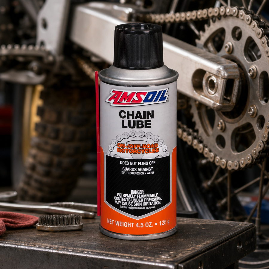 AMSOIL Chain Lube staged in an automotive workshop