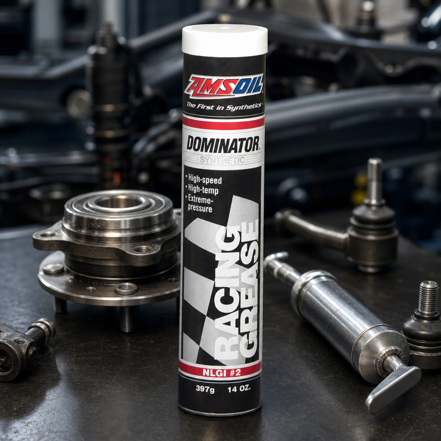 AMSOIL DOMINATOR Synthetic Racing Grease staged in a performance race shop