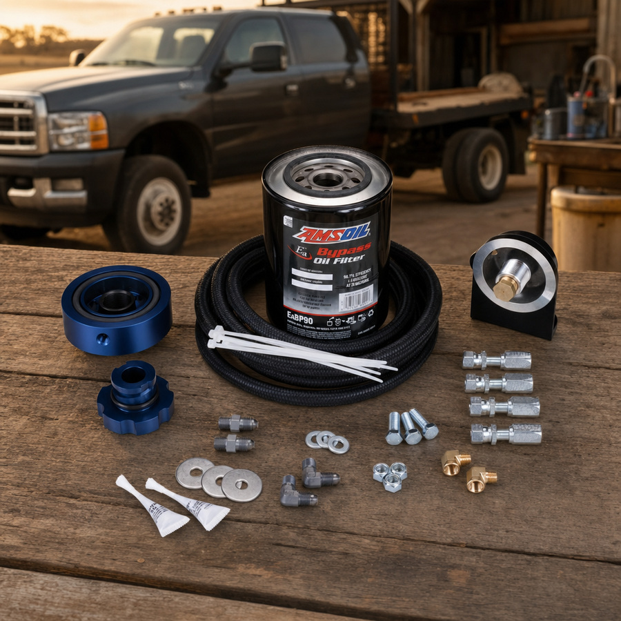 AMSOIL Ford 6.7L Single-Remote Bypass System staged in a truck maintenance garage