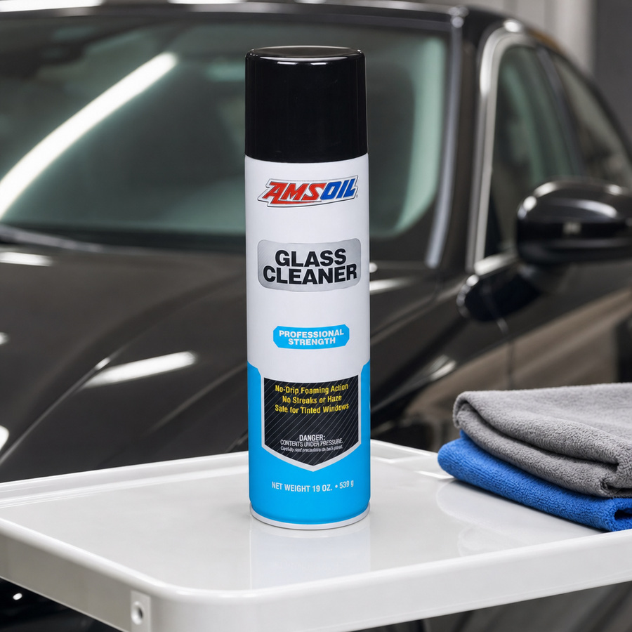 AMSOIL Glass Cleaner staged in a car detailing bay