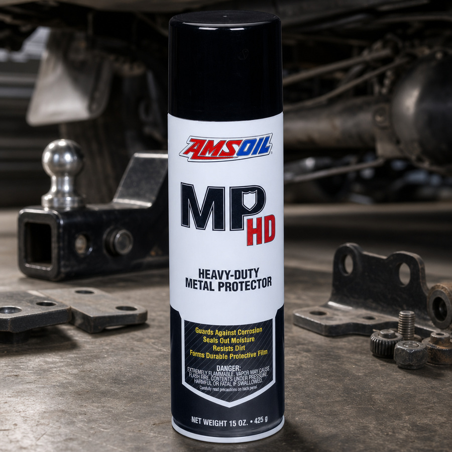 AMSOIL Heavy-Duty Metal Protector staged in an automotive workshop