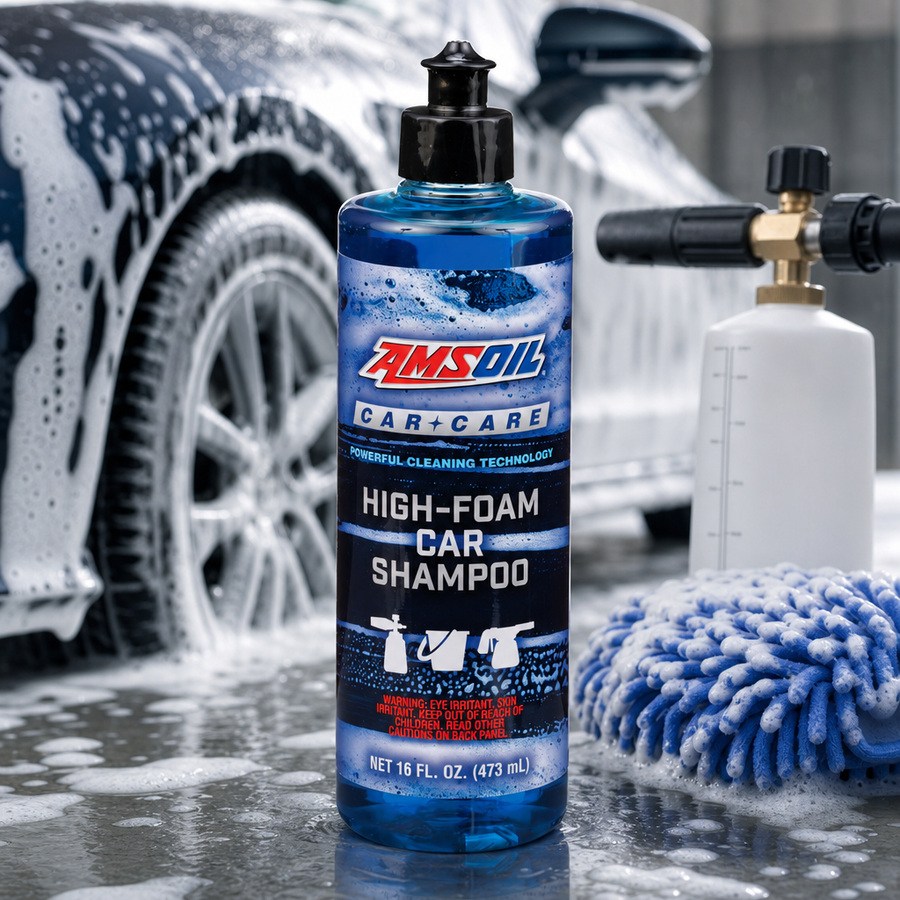 AMSOIL High-Foam Car Shampoo staged in an automotive workshop