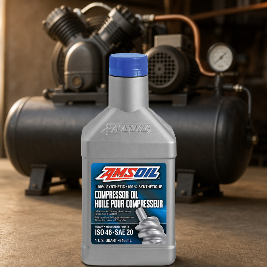 AMSOIL ISO 46 100% Synthetic Compressor Oil staged in an industrial compressor room
