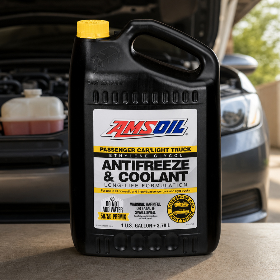 AMSOIL Passenger Car & Light Truck Antifreeze & Coolant staged in a radiator service bay