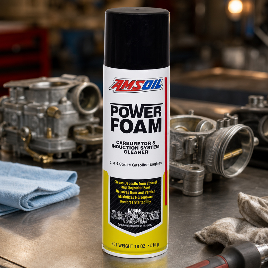 AMSOIL Power Foam Carburetor and Induction-System Cleaner staged in a car detailing bay