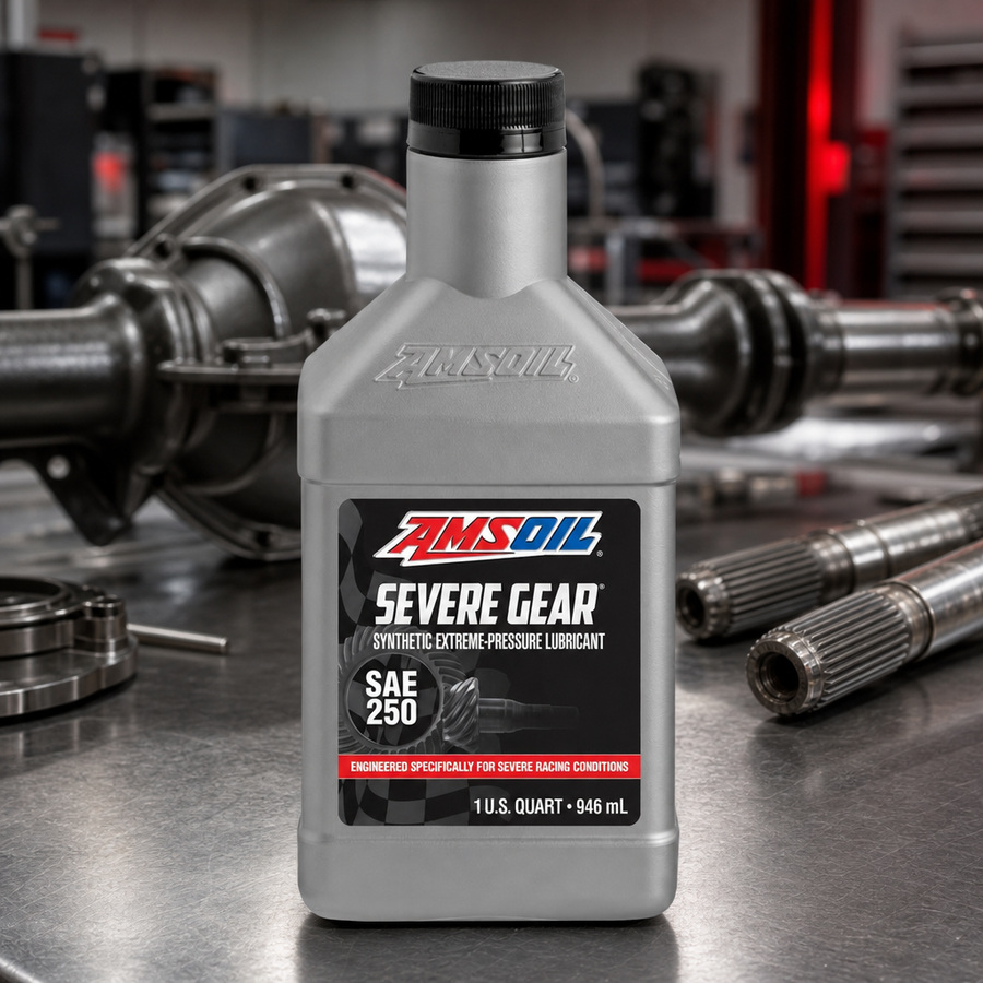 AMSOIL SEVERE GEAR SAE 250 100% Synthetic Gear Lube staged in a drivetrain and gear workshop