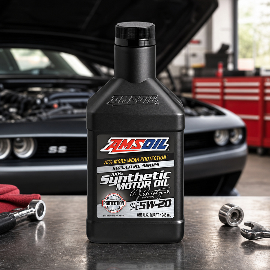 AMSOIL Signature Series 5W-20 100% Synthetic Motor Oil staged in an automotive service garage