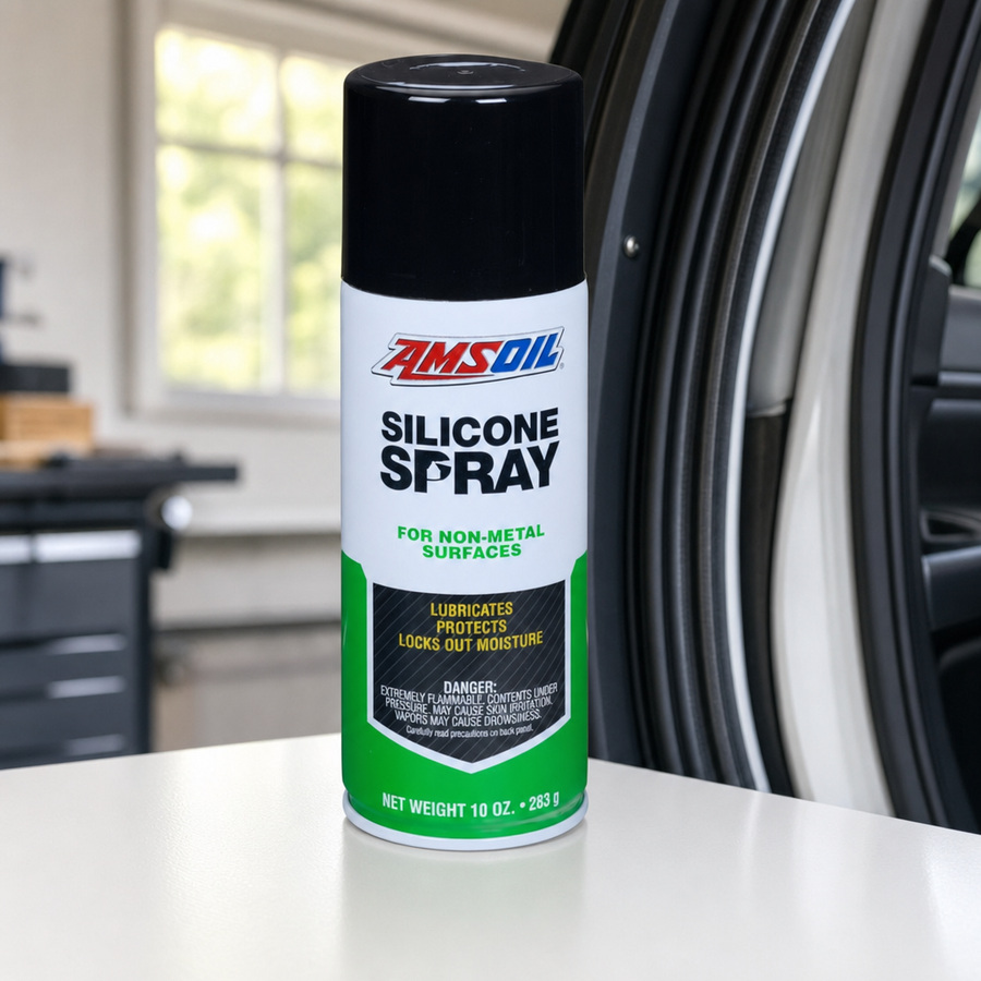 AMSOIL Silicone Spray staged in a mechanic workbench