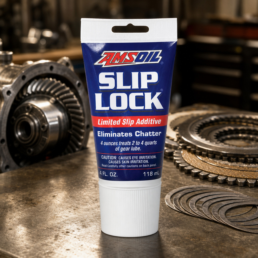 AMSOIL Slip Lock Differential Additive staged in a drivetrain and gear workshop
