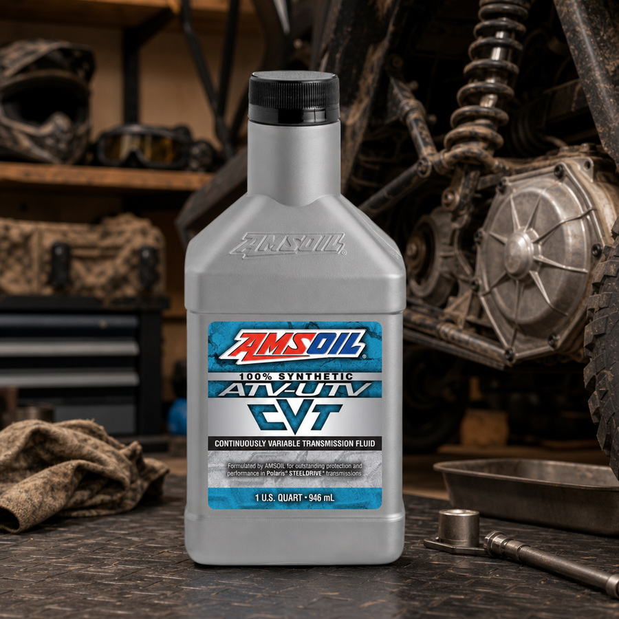 AMSOIL 100% SYNTHETIC ATV/UTV CONTINUOUSLY VARIABLE TRANSMISSION FLUID staged in a powersports service garage