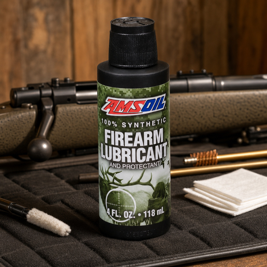 AMSOIL 100% Synthetic Firearm Lubricant and Protectant staged in a gun cleaning bench