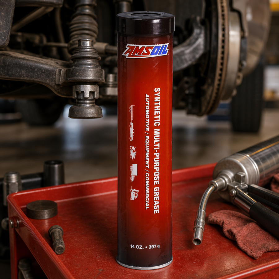 AMSOIL Synthetic Multi-Purpose Grease staged in an equipment maintenance shop