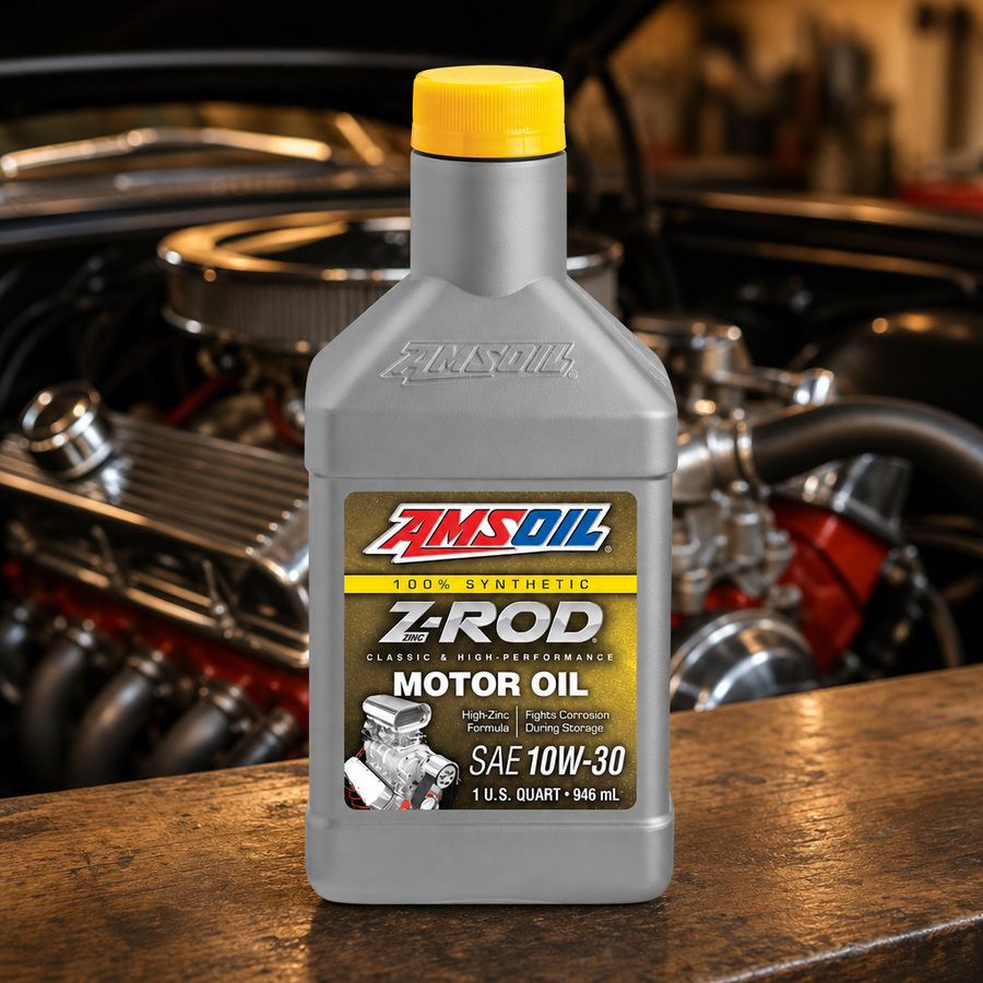 AMSOIL Z-ROD 10W-30 100% Synthetic Motor Oil staged in a classic hot rod garage