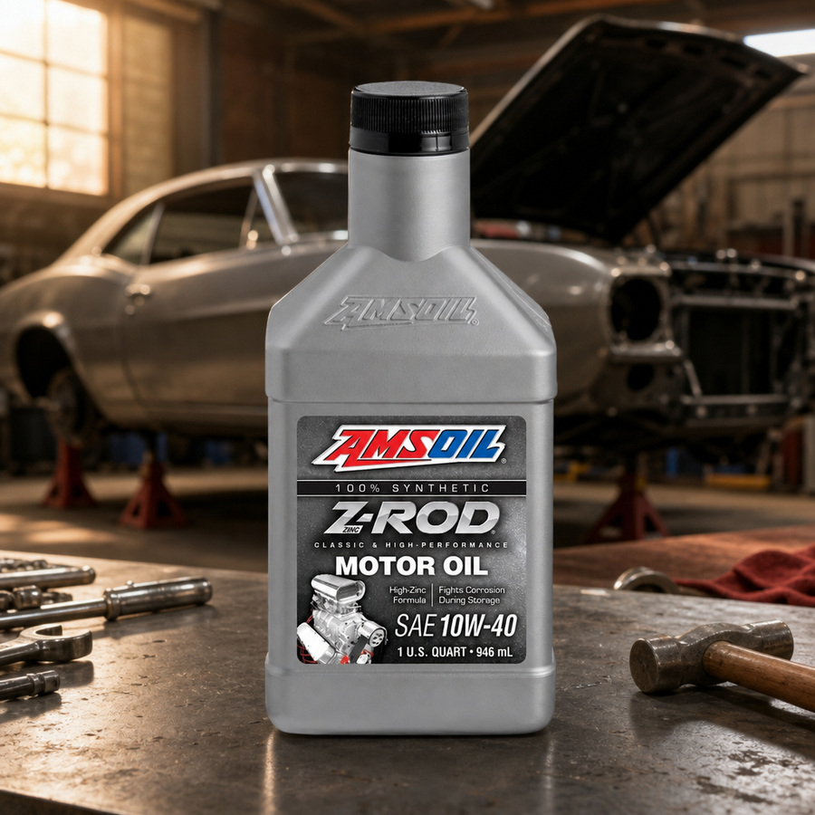 AMSOIL Z-ROD 10W-40 100% Synthetic Motor Oil staged in a classic hot rod garage