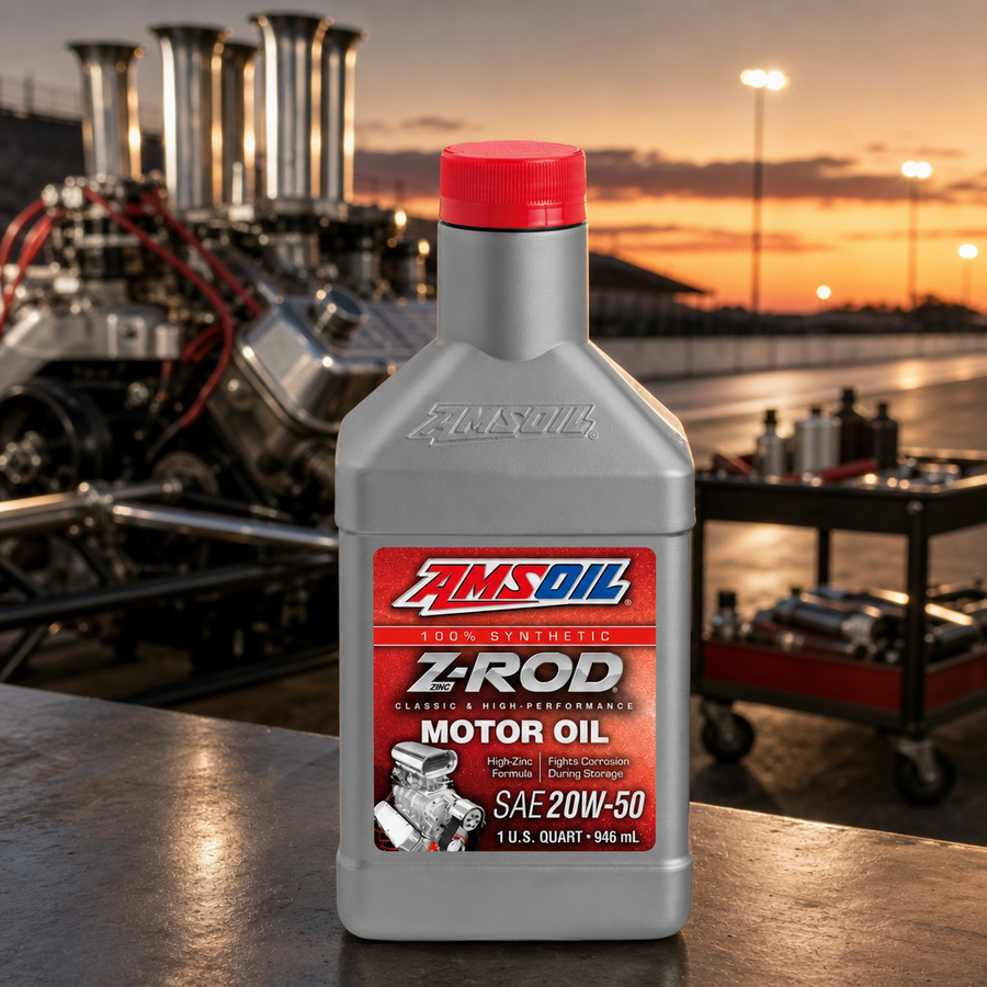 AMSOIL Z-ROD 20W-50 100% Synthetic Motor Oil staged in a classic hot rod garage